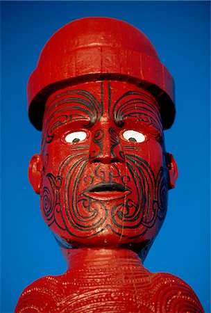 rotorua - Traditional Maori 'Poupou' figure, Whakarewarewa village, Rotorua, New Zealand Stock Photo - Rights-Managed, Code: 841-02723027