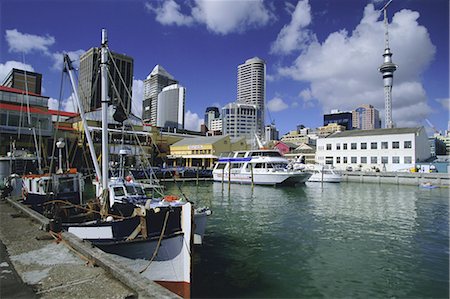 simsearch:841-07354786,k - Boats on waterfront with skyline including Sky City Tower beyond, downtown Auckland, Central Auckland, North Island, New Zealand, Pacific Stock Photo - Rights-Managed, Code: 841-02723030