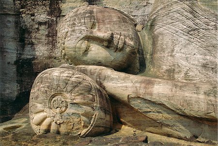 Statue of the reclining Buddha, attaining nirvana, Gal Vihara, Polonnaruwa, Sri Lanka Stock Photo - Rights-Managed, Code: 841-02825884