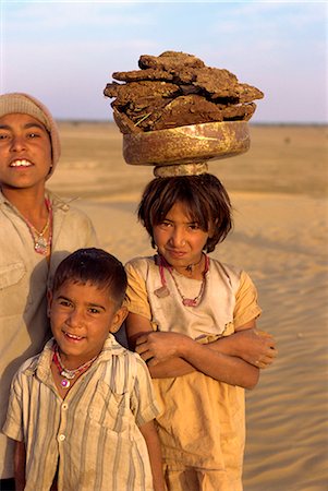 Gathering dung for cooking fires, near Khimsar village, Rajasthan state, India, Asia Stock Photo - Rights-Managed, Code: 841-02826183