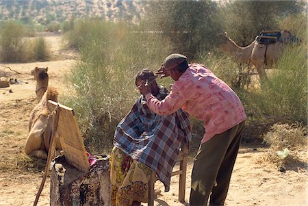 Outdoor barber, Cattle fair near Dechhu, north of Jodhpur, Rajasthan state, India, Asia Stock Photo - Rights-Managed, Code: 841-02826242
