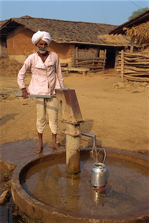 pumping - Village well, Dhariyawad, Rajasthan state, India, Asia Stock Photo - Rights-Managed, Code: 841-02830748