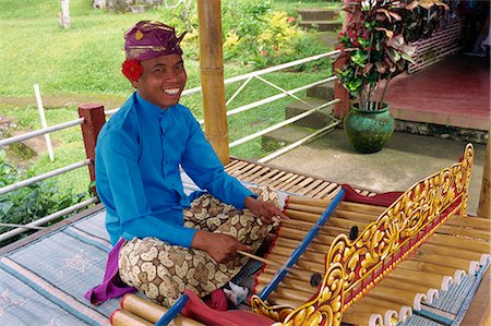 Portrait d'un homme jouant du xylophone sur Bali, en Indonésie, Asie du sud-est, Asie Photographie de stock - Rights-Managed, Code: 841-02831329