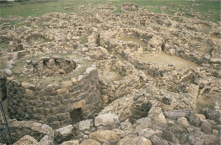 Su Nuraxi Nuraghic complex dating from 1500BC, ruins of possibly a palace dating from circa 1500BC, excavated since 1949, UNESCO World Heritage Site, Barumini, Marmilla region, Sardinia, Italy, Europe Stock Photo - Rights-Managed, Code: 841-02831936