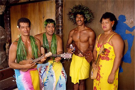 A group of Polynesian musicians welcome visitors to Moorea, Tahiti, Pacific Islands, Pacific Foto de stock - Con derechos protegidos, Código: 841-02832060