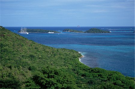 Vue depuis l'île Mayreau vers les Tobago Cays, The Grenadines, îles sous-le-vent, Antilles, Caraïbes, Amérique centrale Photographie de stock - Rights-Managed, Code: 841-02832105