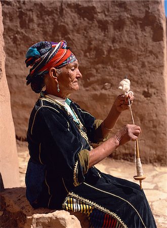 simsearch:841-02832437,k - Old woman in traditional dress, demonstrates spinning wool by distaff, near Ouarzazate, Morocco, North Africa, Africa Stock Photo - Rights-Managed, Code: 841-02832437