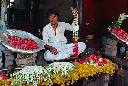 Portrait of a man selling garlands of flowers in the flower market in Lahore, Punjab, Pakistan, Asia Stock Photo - Rights-Managed, Code: 841-02832812