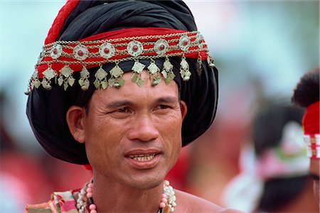 simsearch:841-02924082,k - Head and shoulders portrait of a man of the Hwalien tribe during harvest festival in August-September in Taiwan, Asia Stock Photo - Rights-Managed, Code: 841-02832828