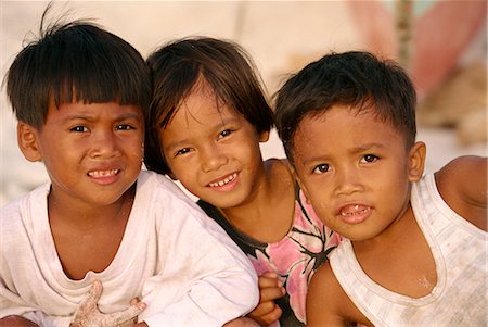 Portrait of children at Boracay Island in the Philippines, Southeast Asia, Asia Foto de stock - Direito Controlado, Número: 841-02899068