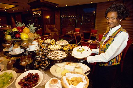 durban - Showing off the evening's spread in Durban, South Africa, Africa Fotografie stock - Rights-Managed, Codice: 841-02899166