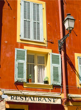 provence restaurant - Architectural detail of lamp and shuttered windows above a restaurant awning, Old Town, Nice, Alpes Maritimes, Provence, French Riviera, France, Europe Stock Photo - Rights-Managed, Code: 841-02899397