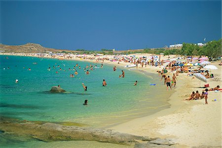 Tourists on the beach and in the sea at Prokopios Beach on Naxos, Cyclades Islands, Greek Islands, Greece, Europe Stock Photo - Rights-Managed, Code: 841-02899422