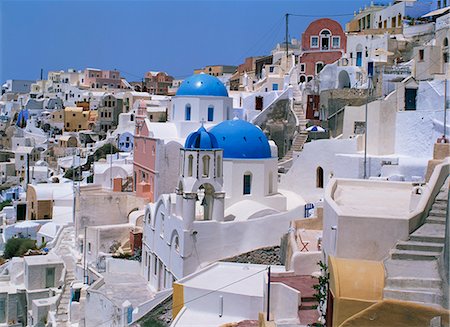 Vue sur les coupoles bleues et blanches maisons du village d'Oia, Santorini (Thira), Cyclades, îles grecques, Grèce, Europe Photographie de stock - Rights-Managed, Code: 841-02899441