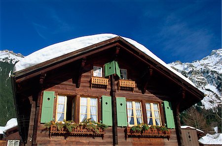Old wooden chalet with shutters and covered in snow at Wengen in the Bernese Oberland, Switzerland, Europe Stock Photo - Rights-Managed, Code: 841-02899557