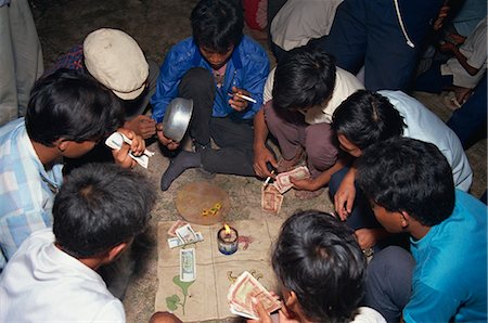 Gambling with dice, Cambodia, Indochina, Southesat Asia, Asia Stock Photo - Rights-Managed, Code: 841-02900025