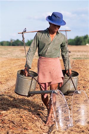 simsearch:841-02916482,k - Farmer with watering cans, Cambodia, Indochina, Southeast Asia, Asia Foto de stock - Direito Controlado, Número: 841-02900063