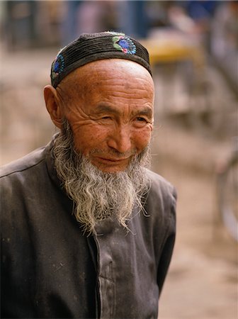 provincia di xinjiang - Man in Turfan market, Turfan, Xinjiang Province, China, Asia Fotografie stock - Rights-Managed, Codice: 841-02900071
