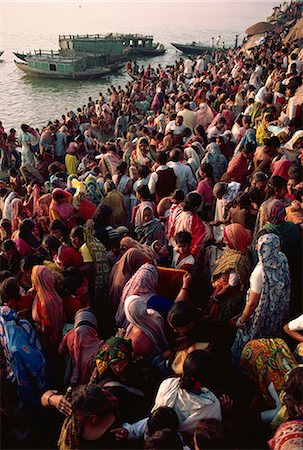 Mass bathing in the holy River Ganga to celebrate the Kartik Poonima festival Varanasi, Uttar Pradesh state, India, Asia Stock Photo - Rights-Managed, Code: 841-02900308