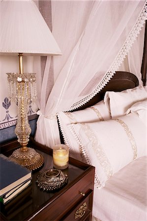 Detail of side table and four poster bed in bedroom, Lutyens style bungalow, New Delhi, India, Asia Stock Photo - Rights-Managed, Code: 841-02900474