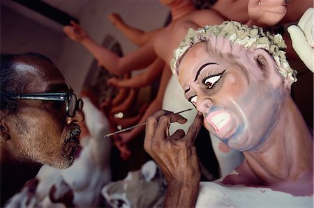 effigy - Painting clay based image of Durga, the ten armed warrior goddess, for use in the Durga Puja festival, Varanasi, Uttar Pradesh, India, Asia Stock Photo - Rights-Managed, Code: 841-02900470