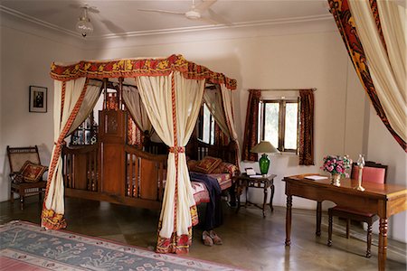 furniture india - Reproduction colonial style four poster bed and block printed fabrics in guest bedroom, Samode Haveli, Gangapol District, Jaipur, Rajasthan state, India, Asia Stock Photo - Rights-Managed, Code: 841-02900516