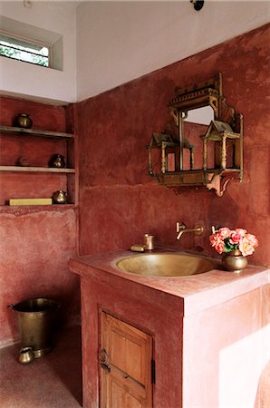 Pink finished plaster walls and hand beaten brass bathroom sink, residential home, Amber, near Jaipur, Rajasthan state, India, Asia Stock Photo - Rights-Managed, Code: 841-02900559