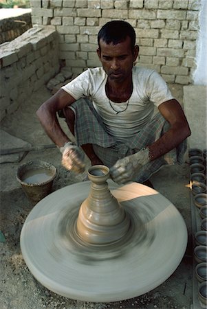 Potter at his wheel, India, Asia Stock Photo - Rights-Managed, Code: 841-02901012