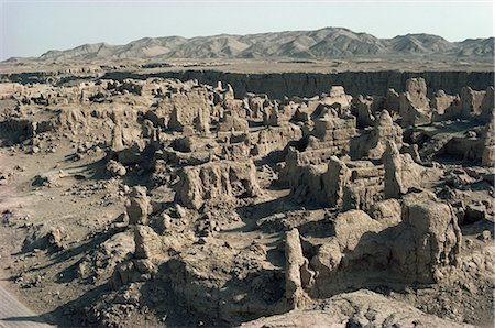 provincia di xinjiang - Ruins of Jiaone (Jiaohe), old capital on the Silk Road, dating from 1st century AD, Turpan Depression, Xinjiang Autonomous Region, China, Asia Fotografie stock - Rights-Managed, Codice: 841-02901124