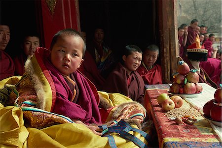 A living Buddha at the Tibetan Uppasilutan Monastery, northeast Qinghai, China, Asia Stock Photo - Rights-Managed, Code: 841-02901210