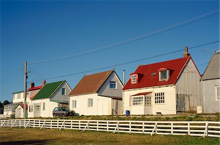 Maisons de bois et ondulée bordent une rue typique de Stanley, la capitale des îles Falkland, Amérique du Sud Photographie de stock - Rights-Managed, Code: 841-02901615