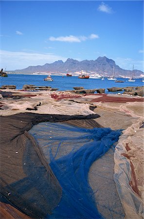 simsearch:841-06806615,k - Nets laid out to dry on dockside, Mindelo, Sao Vicente, Cape Verde Islands, Atlantic, Africa Stock Photo - Rights-Managed, Code: 841-02901764