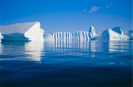 distance clear view - Icebergs exhibiting fluting and honeycomb textures, Antarctica Stock Photo - Rights-Managed, Code: 841-02901853
