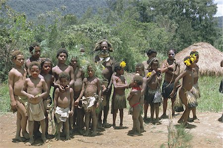 Portrait of a Huli man and group of children Highlands, Papua New Guinea, Pacific Stock Photo - Rights-Managed, Code: 841-02902000