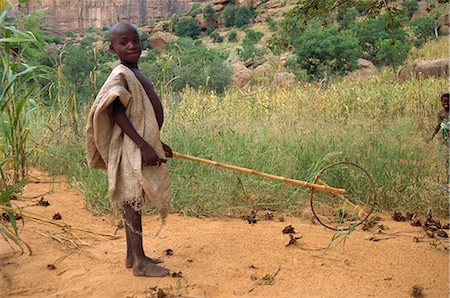 dogon - Dogon boy with home made toy, Mali, Africa Stock Photo - Rights-Managed, Code: 841-02902242