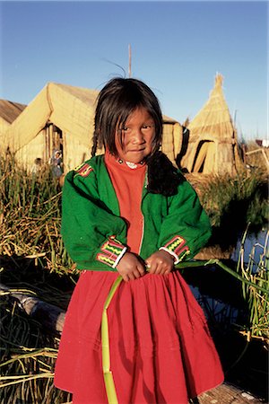 Portrait d'une fille Indiens Uros sur une île de reed floading, Islas Flotantes, lac Titicaca, au Pérou, en Amérique du Sud Photographie de stock - Rights-Managed, Code: 841-02902975