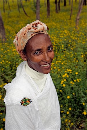 ethiopian flowers - Portrait of a beautiful Ethiopian woman in the countryside near Gonder, The Ethiopian Highlands, Ethiopia, Africa Stock Photo - Rights-Managed, Code: 841-02903090