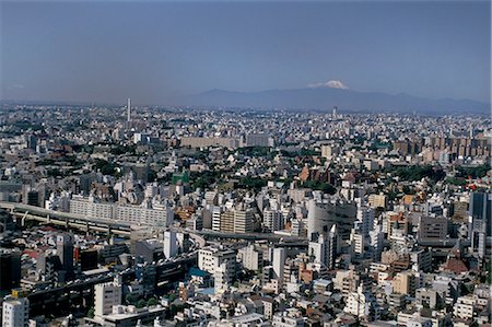 City skyline with Mount Fuji beyond, Tokyo, Japan, Asia Stock Photo - Rights-Managed, Code: 841-02903180