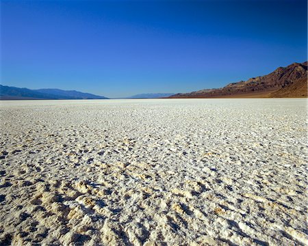 Salt Flats at Badwater, at minus 282 feet the lowest point in the USA, Death Valley National Monument, California/Nevada, United States of America Stock Photo - Rights-Managed, Code: 841-02903295