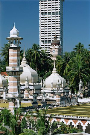 simsearch:841-03064154,k - The Masjid Jamek (Friday Mosque) built in 1909 near Merdeka Square in the city of Kuala Lumpur, Malaysia, Southeast Asia, Asia Foto de stock - Con derechos protegidos, Código: 841-02903467