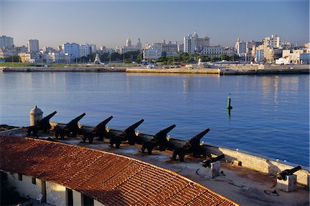 City skyline from El Castillo del Morro, Havana, Cuba, West Indies, Central America Stock Photo - Rights-Managed, Code: 841-02903514