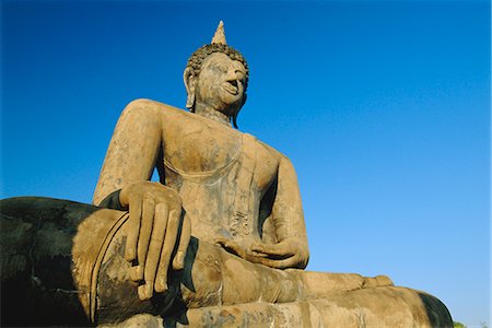 parque histórico de sukhothai - Seated Buddha statue in the Historical Park, old Sukhothai (Muang Kao), Sukhothai, Thailand Foto de stock - Direito Controlado, Número: 841-02903685