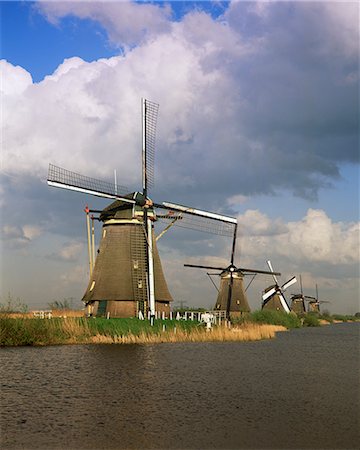 Canal and windmills at Kinderdijk, UNESCO World Heritage Site, Holland, Europe Stock Photo - Rights-Managed, Code: 841-02914769