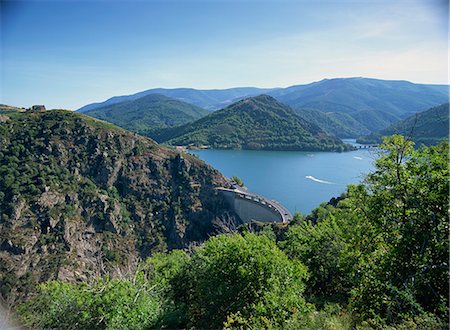 The Cevennes Dam, with the Lac de Villefort and hills in the background, in Lozere, Languedoc Roussillon, France, Europe Stock Photo - Rights-Managed, Code: 841-02915009