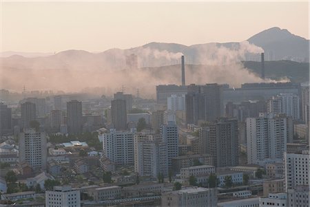 smoke chimney - City centre blocks of flats and unclean power station, Pyongyang, North Korea, Asia Stock Photo - Rights-Managed, Code: 841-02915716