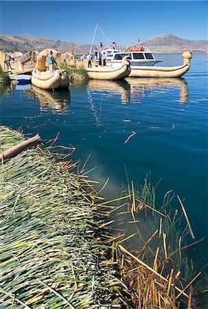 simsearch:841-02705649,k - Traditional Uros (Urus) reed boats at floating island, Islas Flotantas, reed islands, Lake Titicaca, Peru, South America Stock Photo - Rights-Managed, Code: 841-02915795