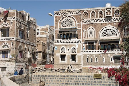 Traditional ornamented brick architecture on houses, Old City, Sana'a, UNESCO World Heritage Site, capital of Yemen, Middle East Foto de stock - Con derechos protegidos, Código: 841-02915882