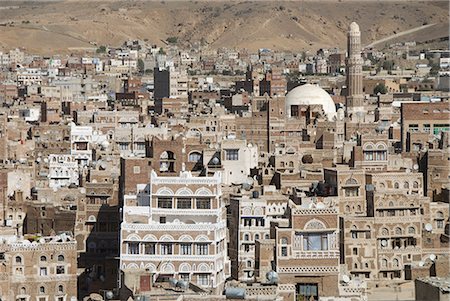 Traditional ornamented brick architecture on tall houses, Old City, within Sana'a, UNESCO World Heritage Site, Yemen, Middle East Foto de stock - Con derechos protegidos, Código: 841-02915883