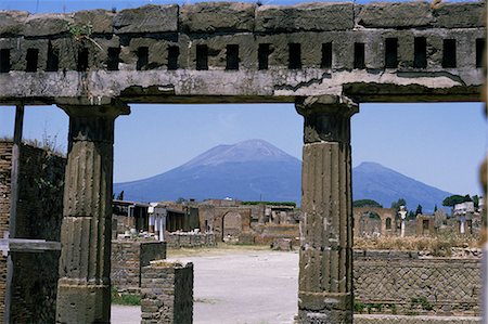 roman forum - Versuvius Volcano seen from Pompeii, buried in AD79 eruption, Renovated stonework of a building on the edge of the Roman Forum, Pompeii, UNESCO World Heritage Site, Campania, Italy, Europe Stock Photo - Rights-Managed, Code: 841-02915937