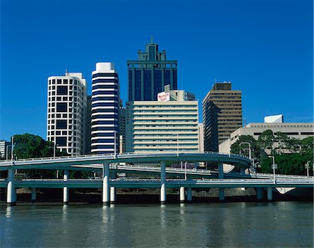 Flyovers above the Brisbane River and the city skyline behind, in Brisbane, Queensland, Australia, Pacific Stock Photo - Rights-Managed, Code: 841-02916116